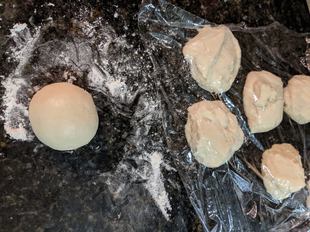 Shaping potato bread rolls