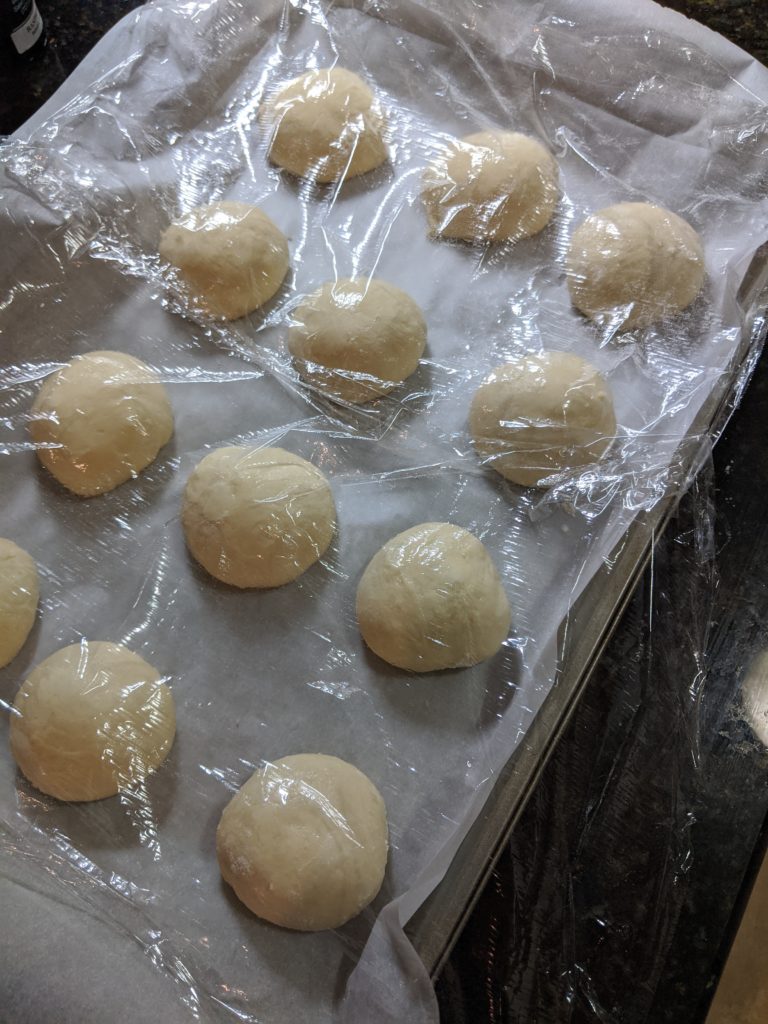 Potato bread rolls shaped and ready to rise again