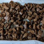 Pumpernickel croutons fresh out of the oven